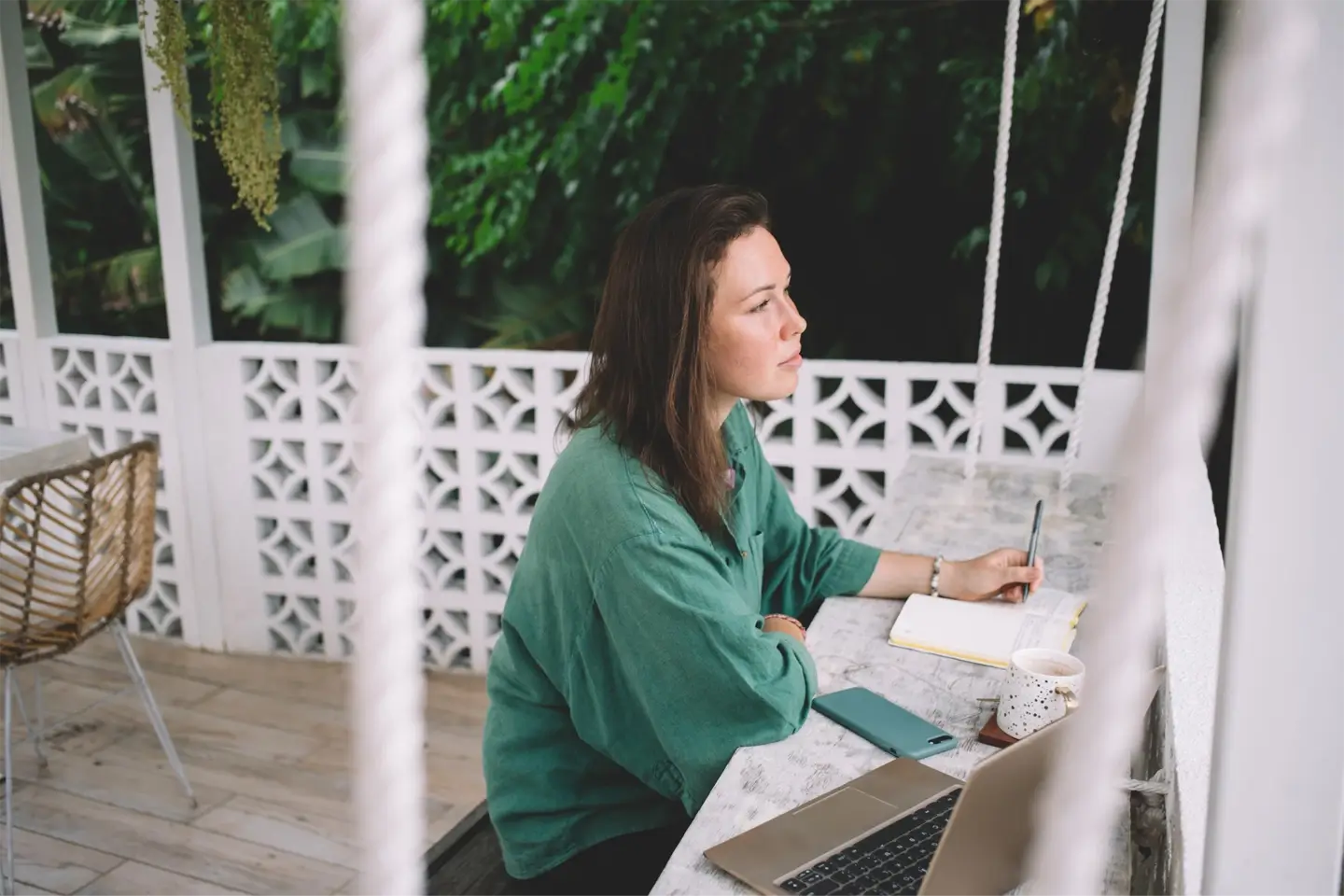 millennial female freelance copywriter with modern laptop working remotely on content text ideas